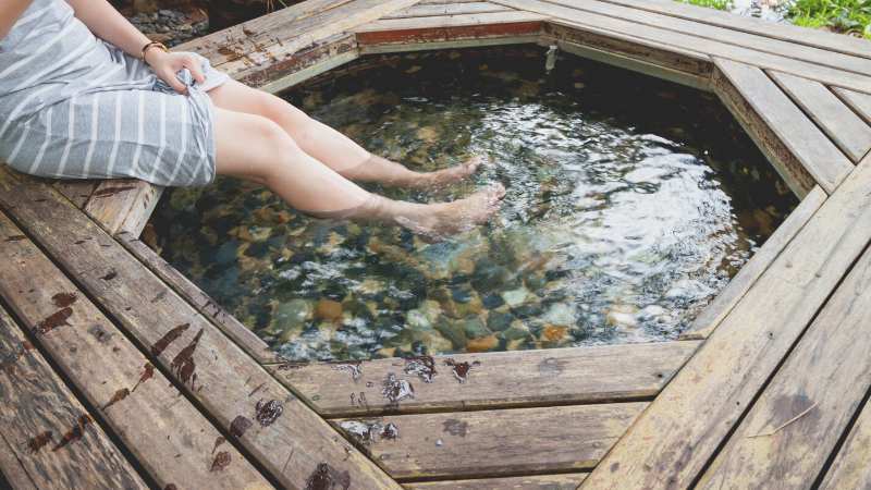 feet in a hot spring